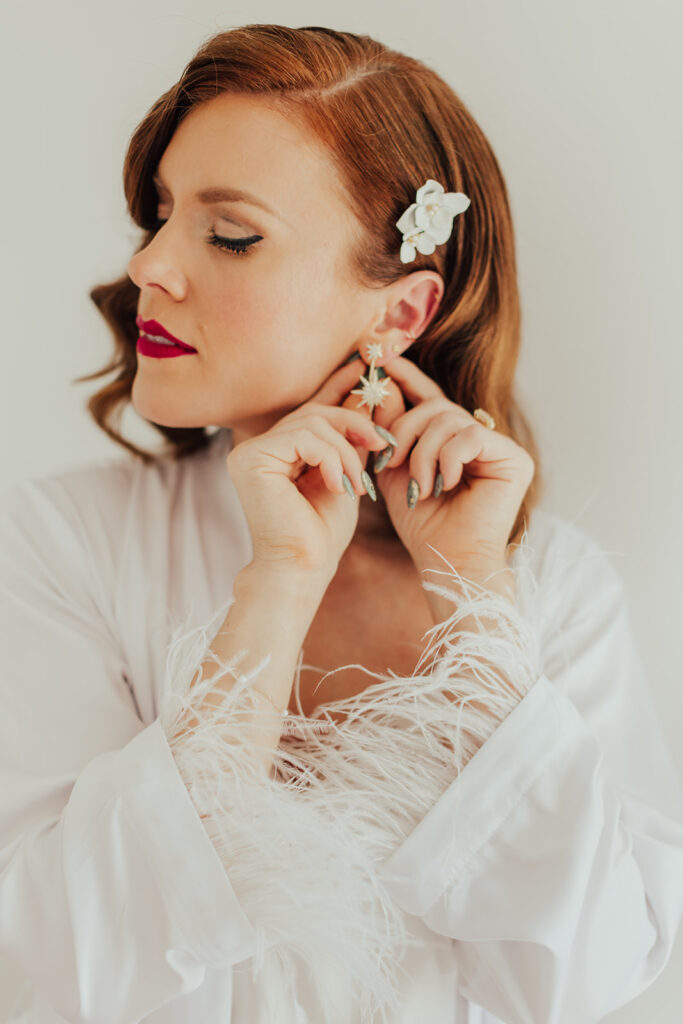 classic hollywood bridal look with soft waves and red lip 