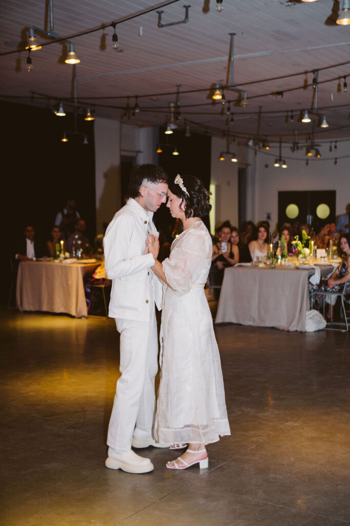 bright and groom first dance at Ace Hotel 