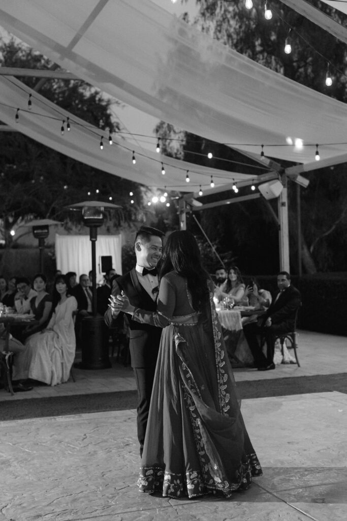 bride and groom first dance during wedding reception 