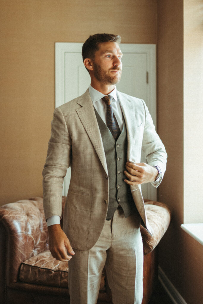 groom in khaki plaid suit 