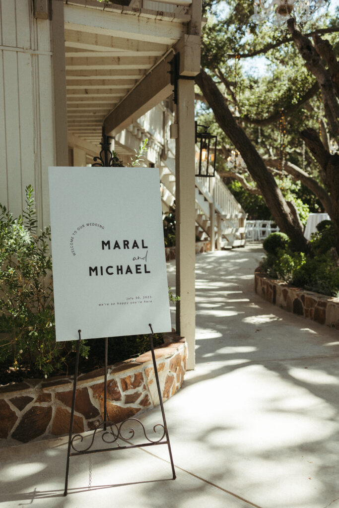 minimalist, refined wedding welcome sign with simple text