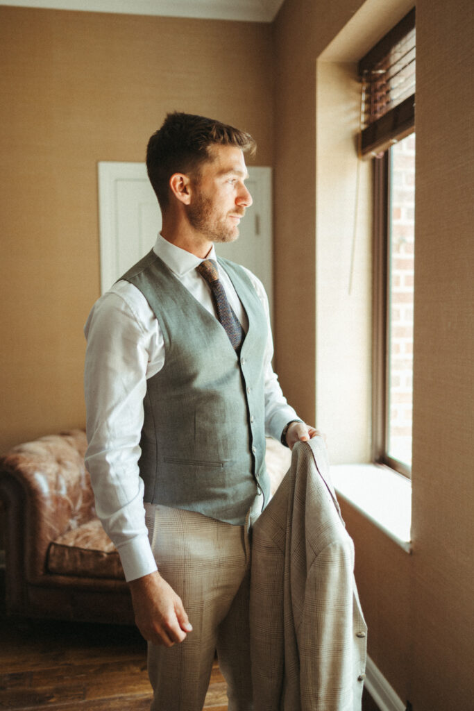 groom in khaki plaid suit