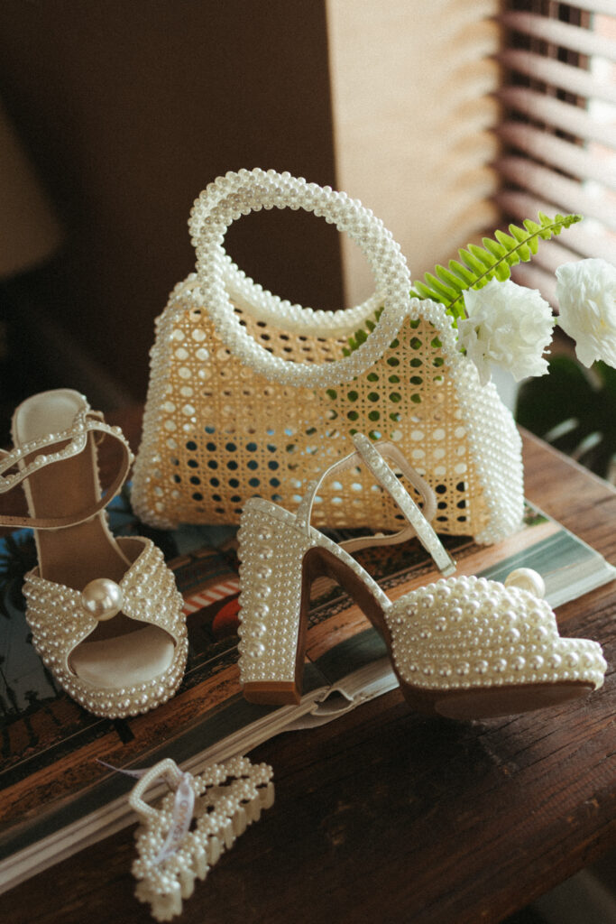 pearl embellished bridal shoes, purse and hair clip