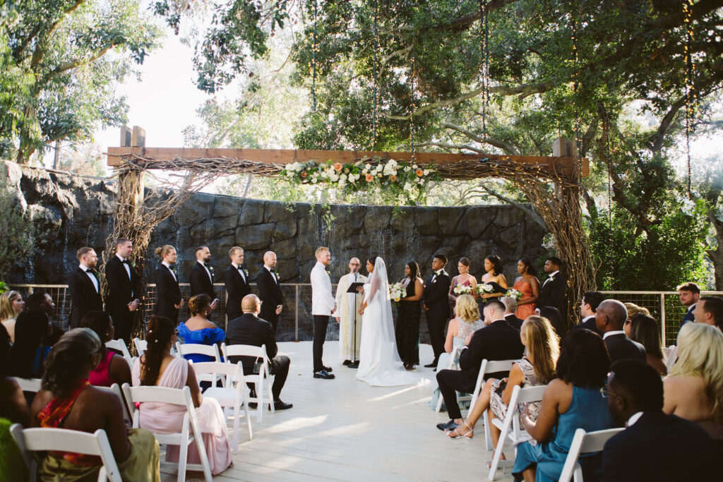 stylish and timeless wedding ceremony at Calamigos Ranch in front of waterfall 